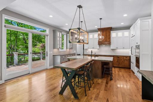 Kitchen and informal dining with access to the deck