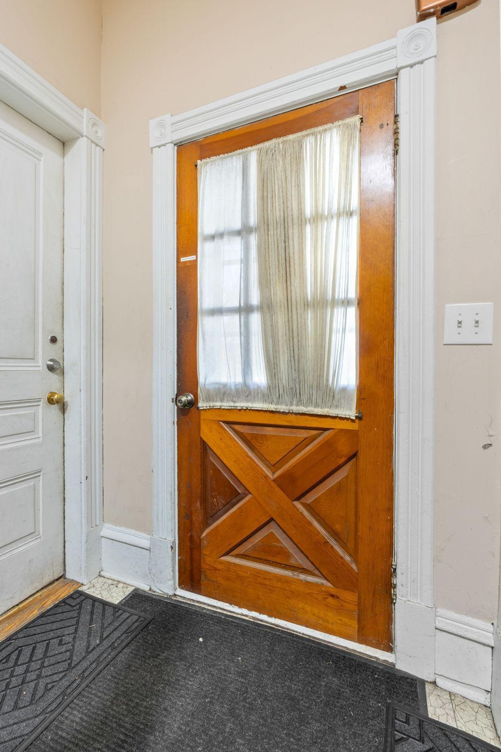 Common front door and hallway/stairwell.