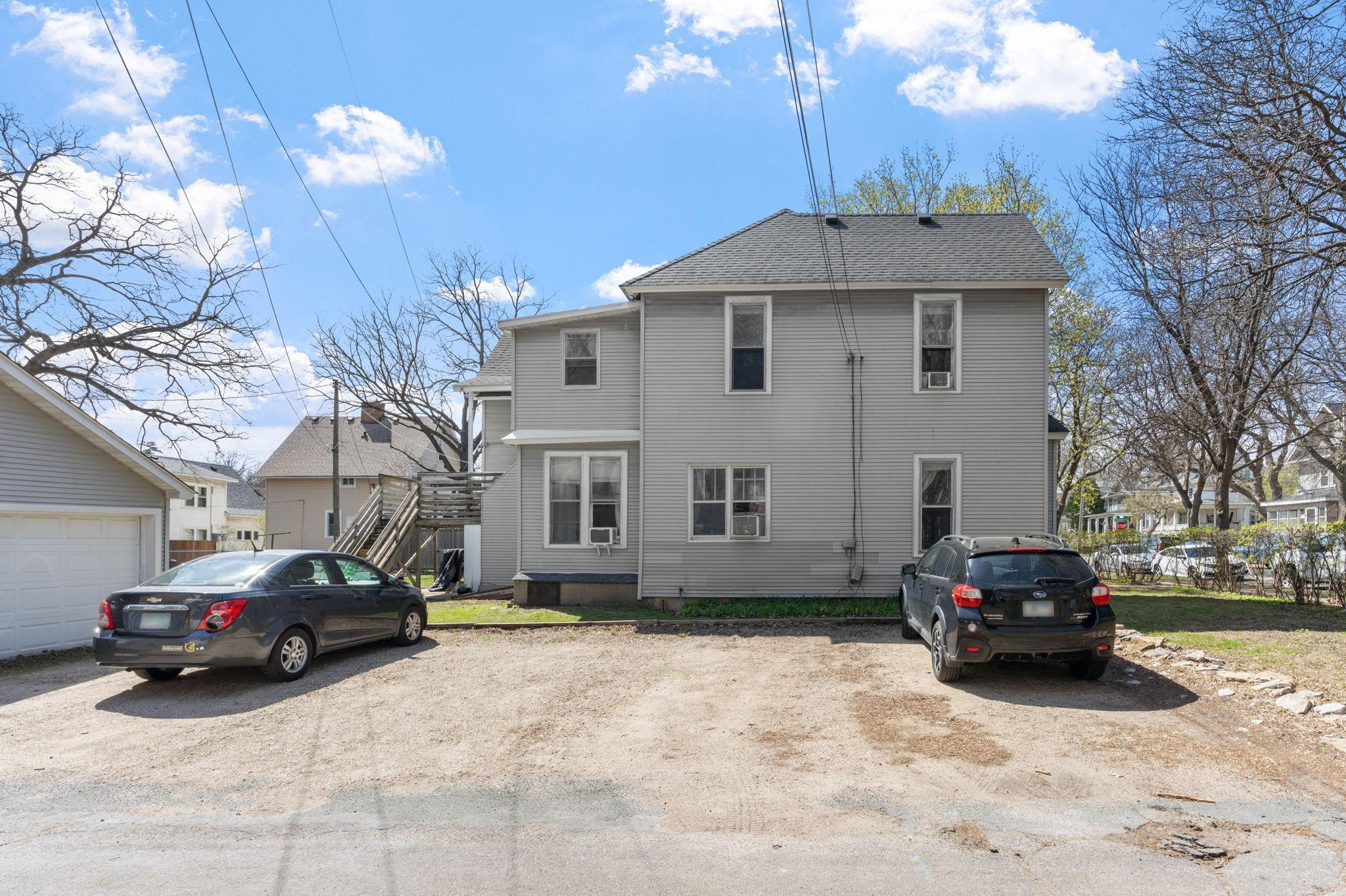 A five car parking lot and 2+ car garage!