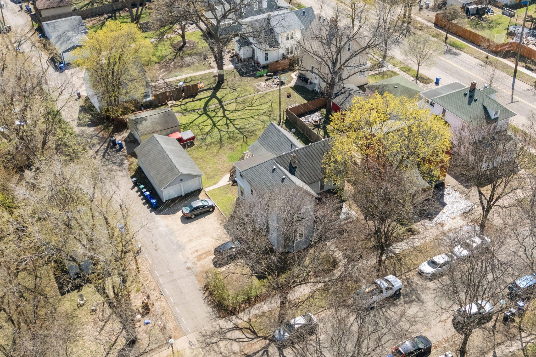 This fourplex offers a huge garage and double lot.