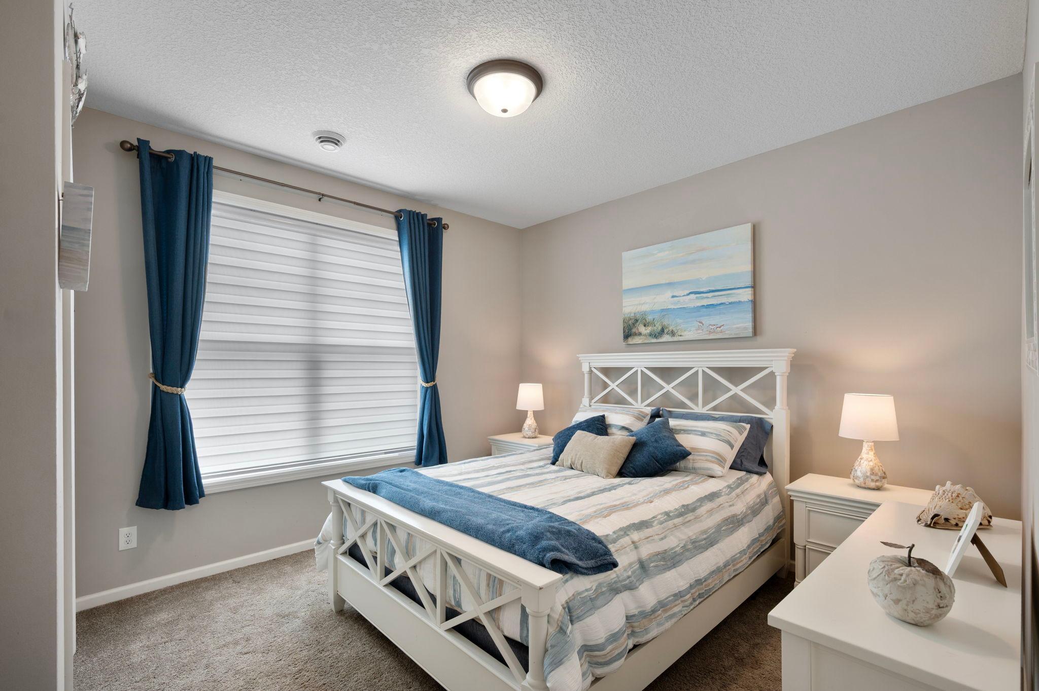 Bedroom at the front of the Home, adjacent to a Full Bathroom