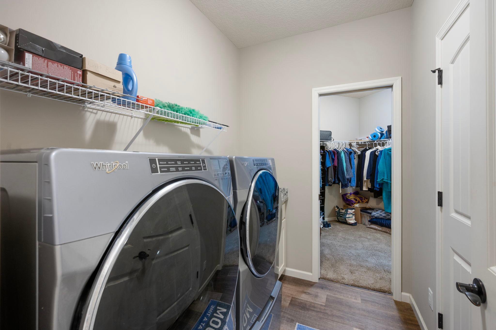 Laundry Room/Utility Room, convenient location adjacent to Primary Closet and Primary Bathroom