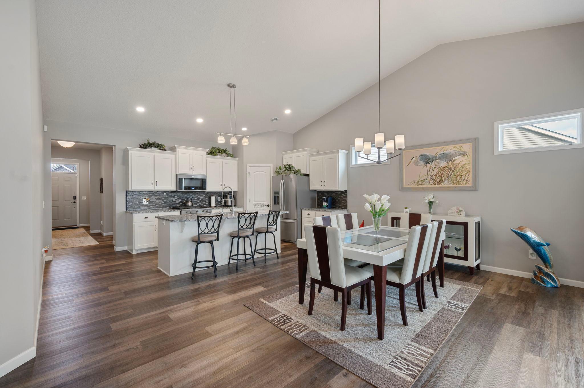 Dining/Flex Room and Kitchen - open and bright!