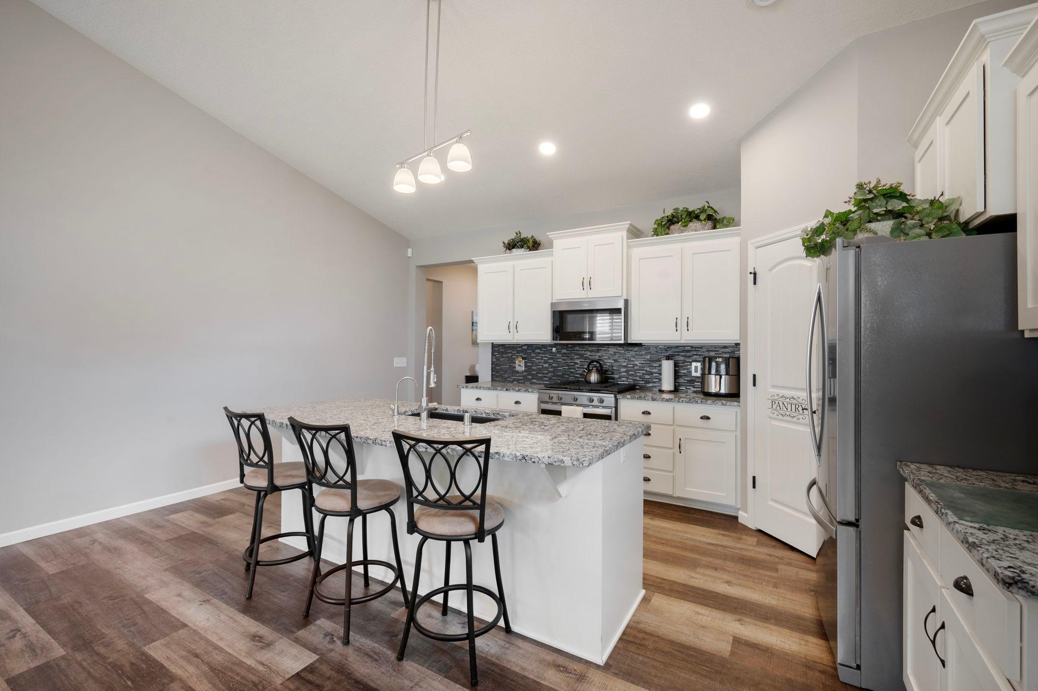 Kitchen - plenty of room to add a Buffet or Hutch for additional storage or a place to hang your special artwork or photo gallery. You get to choose!