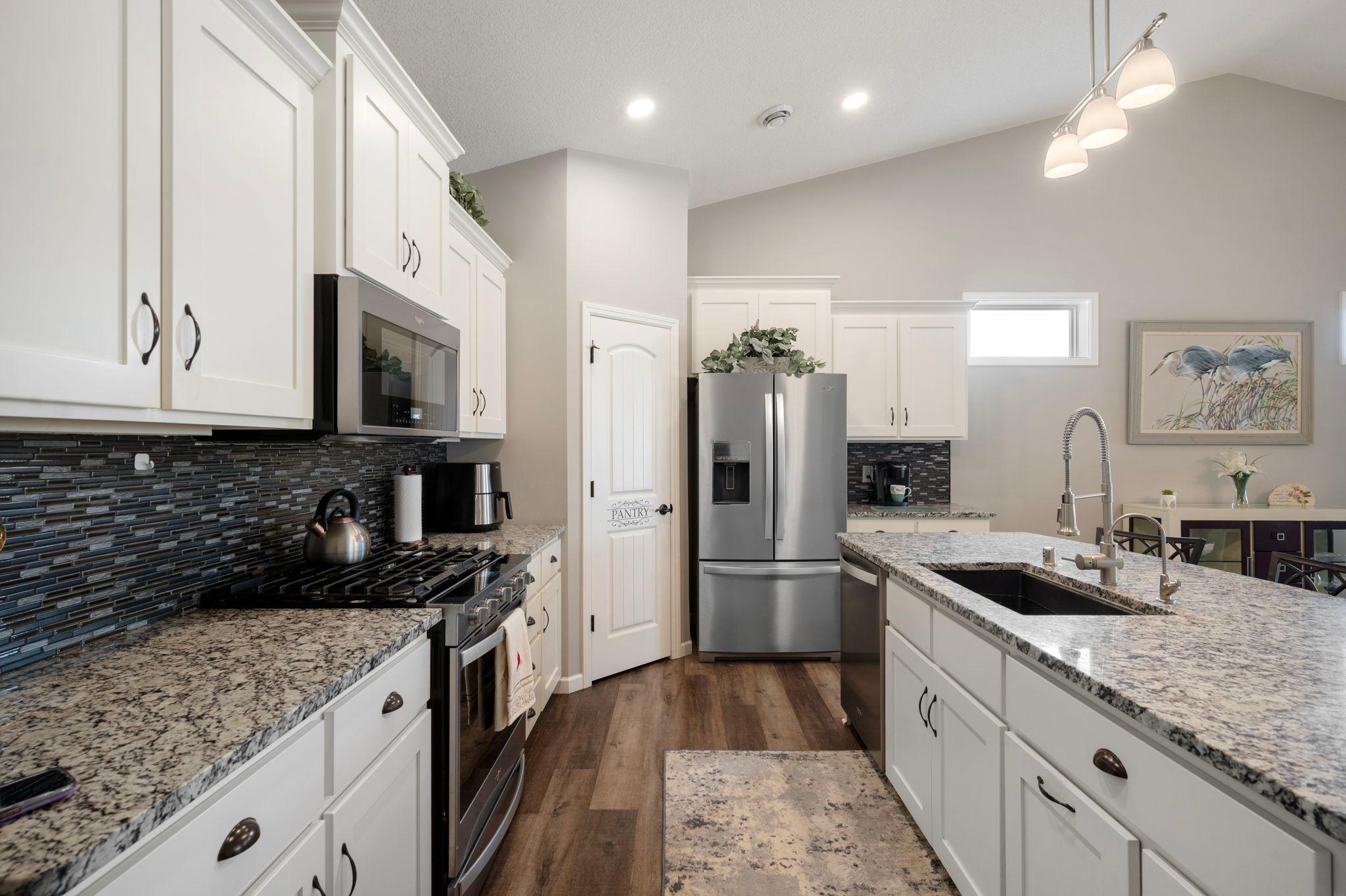Corner Pantry and perfect space for a Coffee Bar next to the Refrigerator