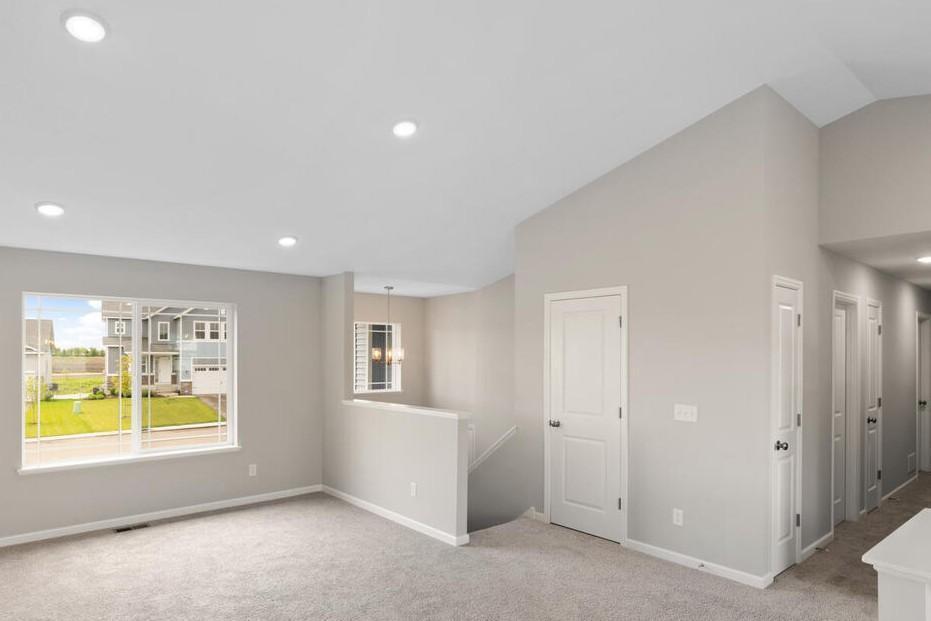 PHOTO OF A DIFFERENT HOME WITH SIMILAR PLAN & FINISHES. Photo may not depict actual plan, material, & finishes included in this home.