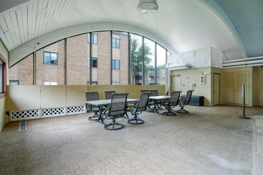 Sitting area next to the large heated pool.