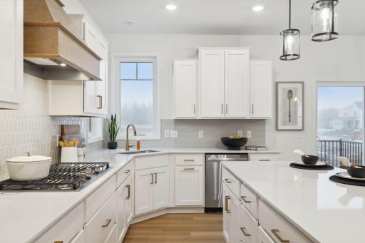 Kitchen - (Staged photo of a model).Pic for representational purposes as finishes may be different.