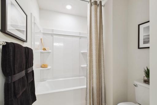LL Full Bath - (Staged photo of a model). Pic for representational purposes as finishes may be different.