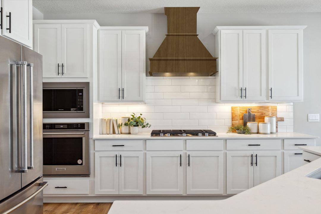 Actual home will be accented with Stained cabinets.