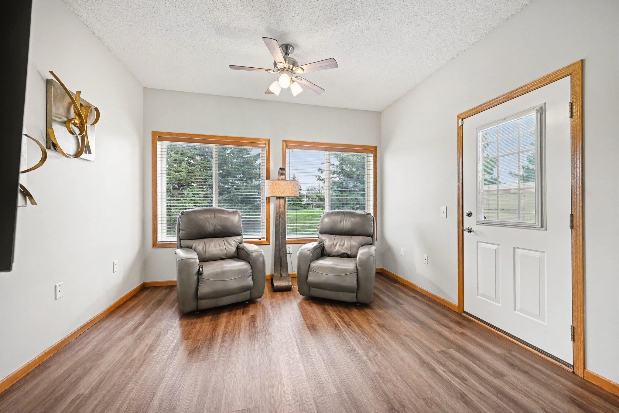 Large sunroom with door to patio