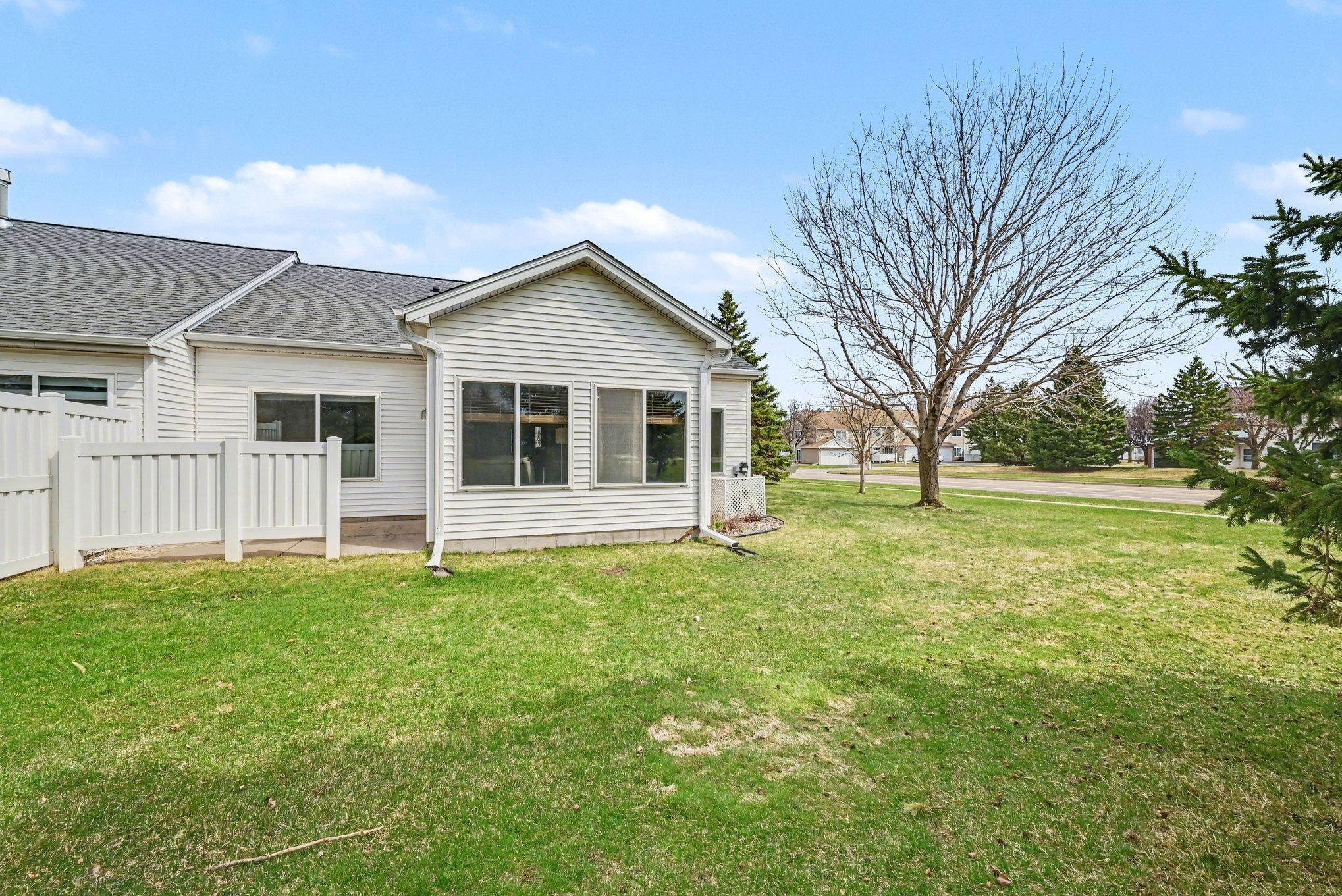 End Unit and large sunroom, plenty of outside space.