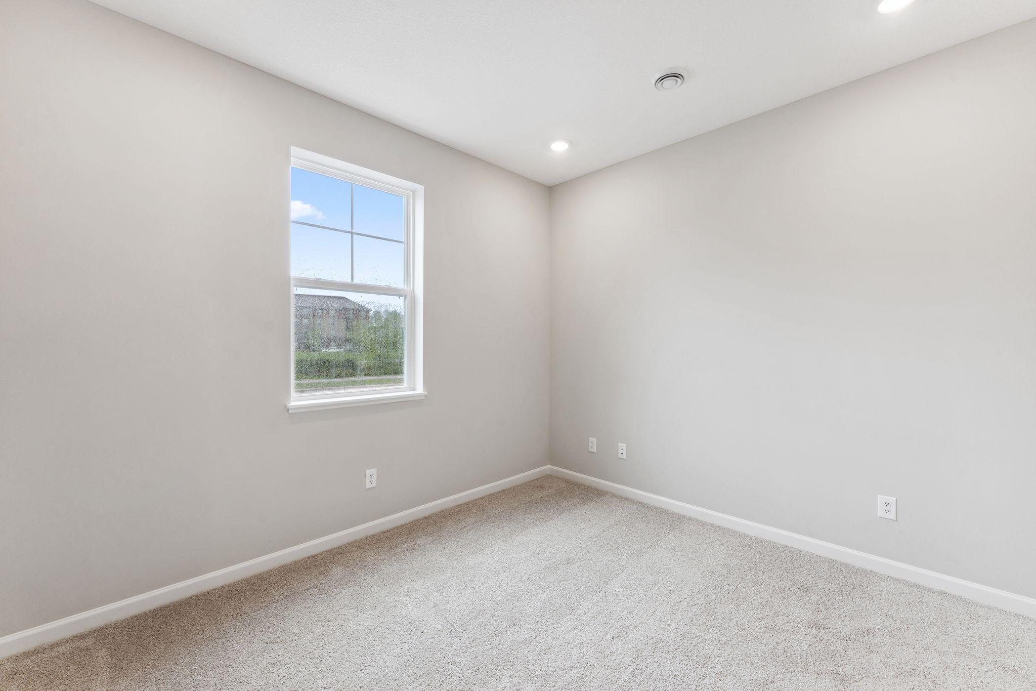 Another view of the flex room offering endless possibilities to fit your evolving lifestyle! Similar home shown, color & finish can vary.