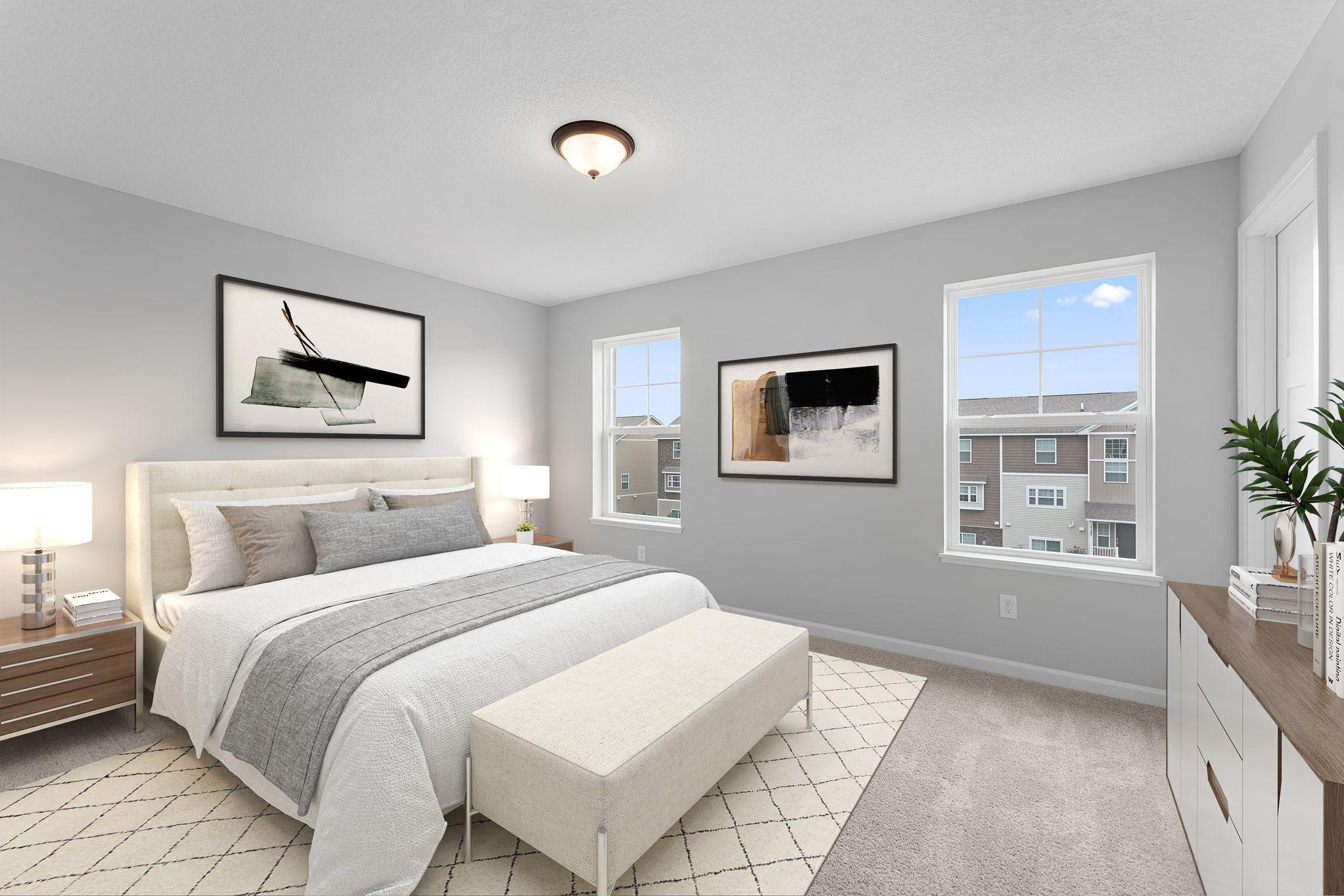 Owner's suite can easily accommodate a king size bed and other furniture pieces. Similar home shown, color & finish can vary.