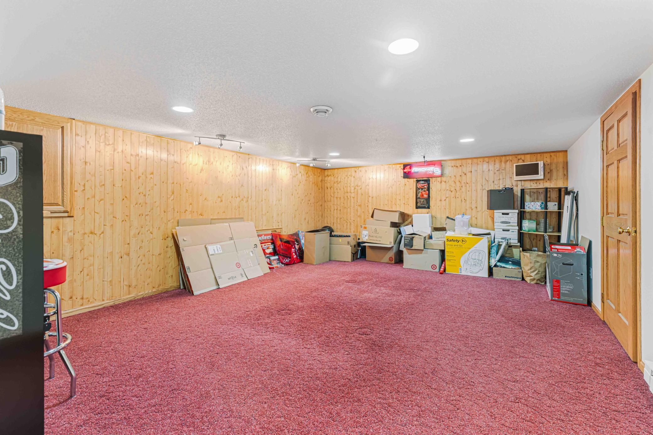 Lower-level recreation room previously used as pool room 19.9' x