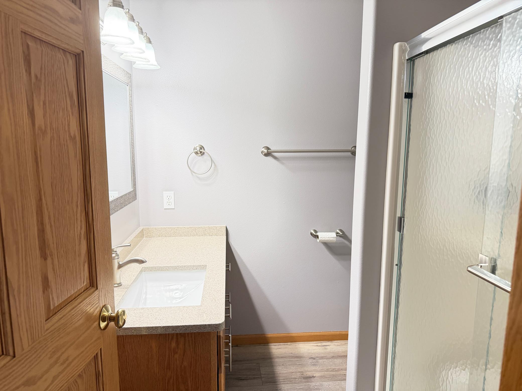 Main floor 3/4 bathroom across from 1st Bedroom