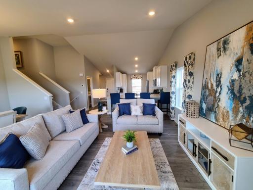 View of Kitchen from Living Room. Photo is of model home. Colors and options may vary. Ask Sales Agent for details.