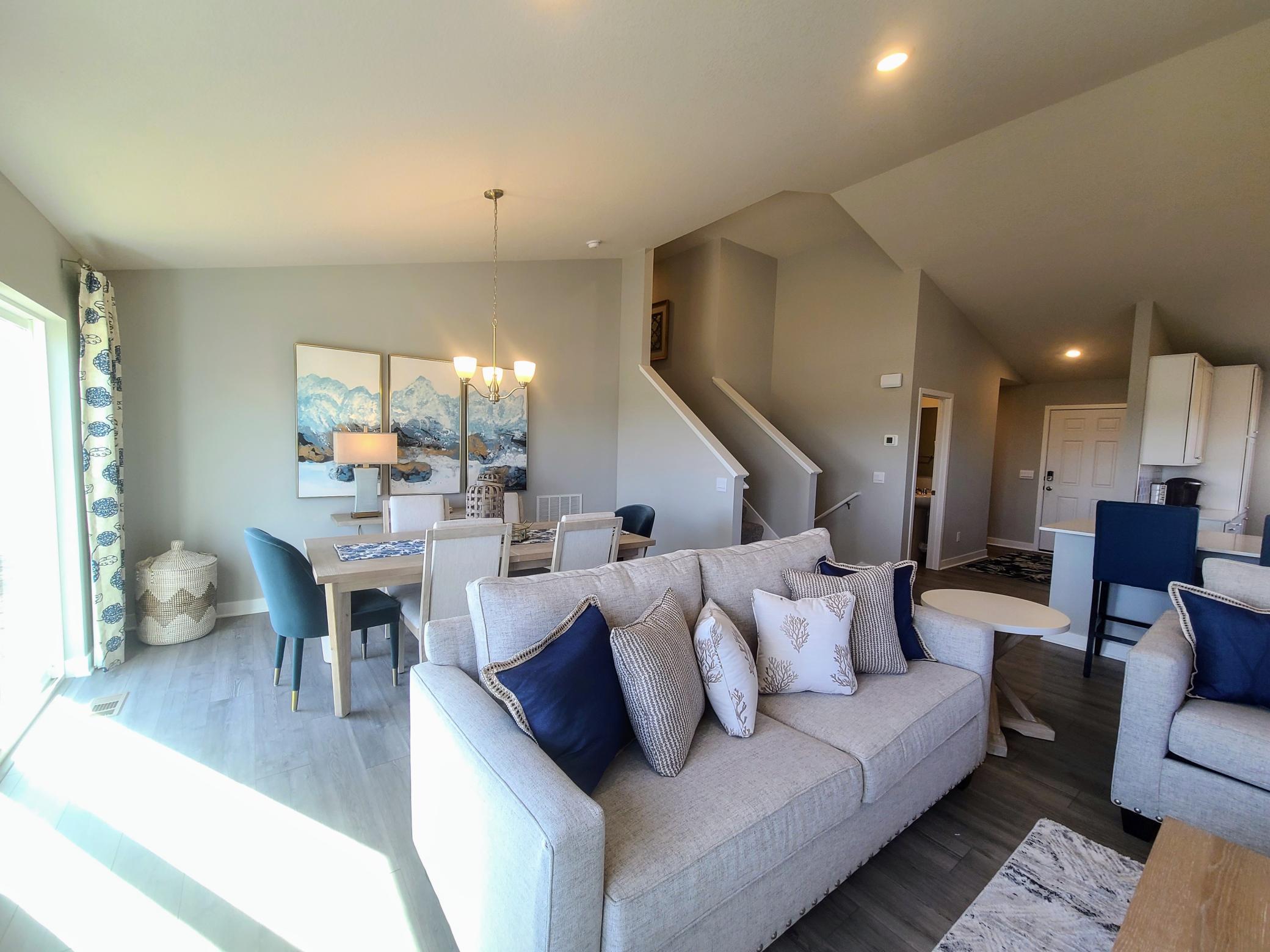 Dining room on the main level, this informal space is large enough to accommodate just about any dining room table configuration! Photo is of model home. Colors and options may vary. Ask Sales Agent for details.