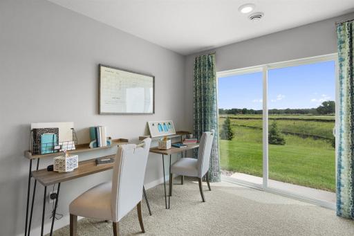 Another view of the FINISHED Walk-out lower level's giant family room! Photo is of model home. Colors and options may vary. Ask Sales Agent for details.