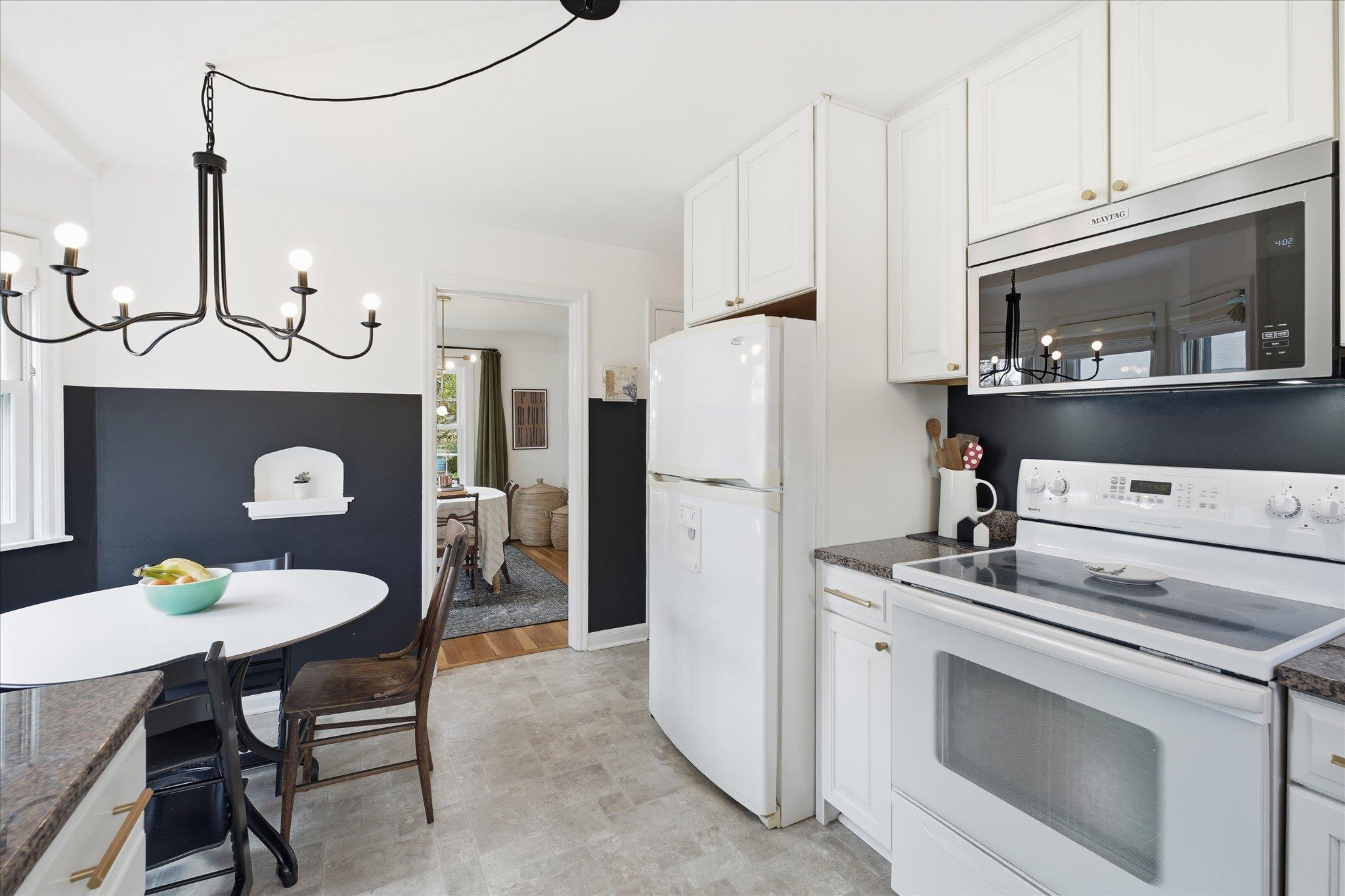 The built-in, counter-depth microwave has hidden controls, making it sleek & clean.