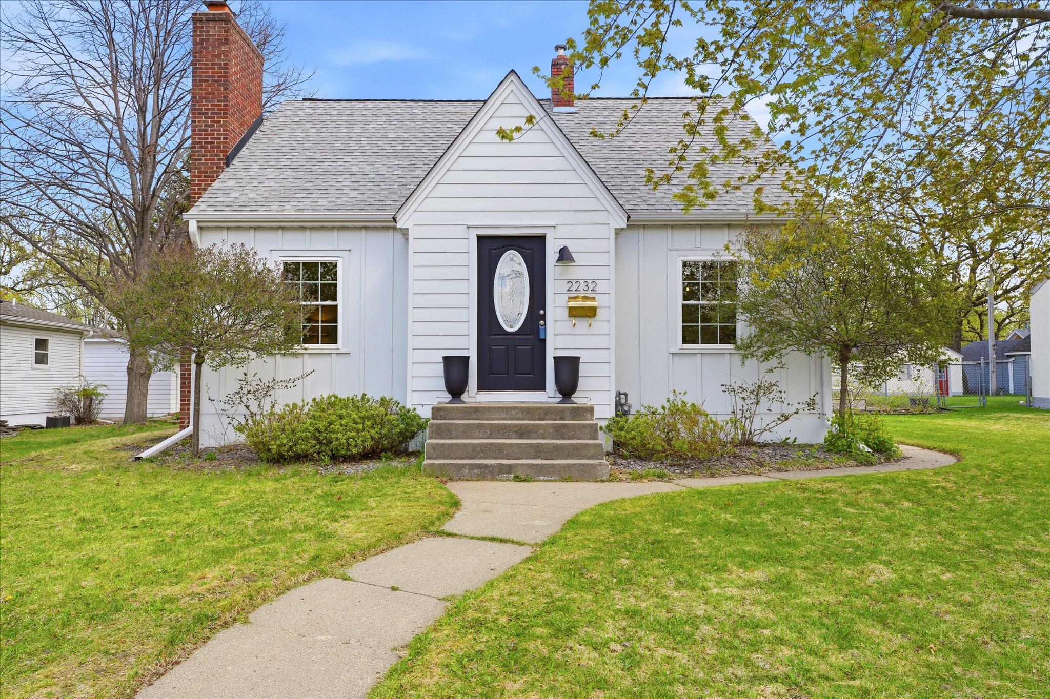 We we begin to approach the front door, we would love to turn your attention to the seamless aluminum gutters, the James Hardie fiber cement siding and the architectural roof shingles. All were replaced just a few years ago!
