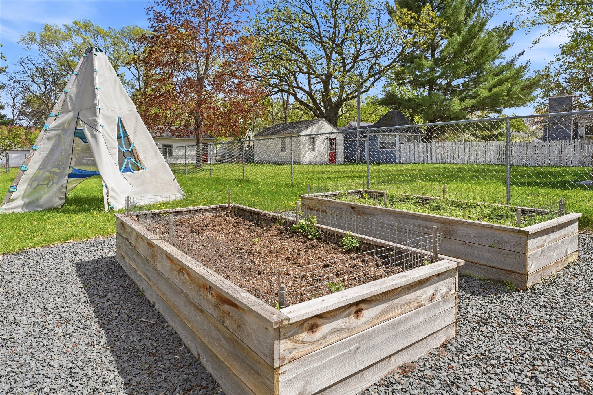 The four garden beds are raised off the ground, so you can control the soil composition.
