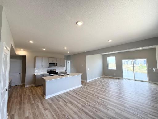 Photo of actual home: Large, bright, and open main floor.