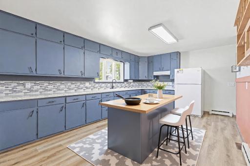 Nicely updated kitchen! (center island is virtually staged)