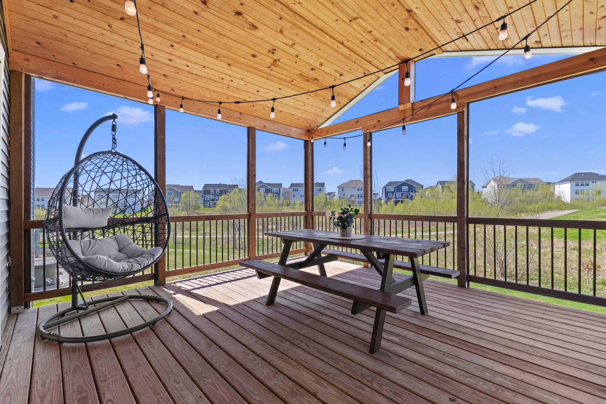 Just steps away is your large, darling, 3-season porch!