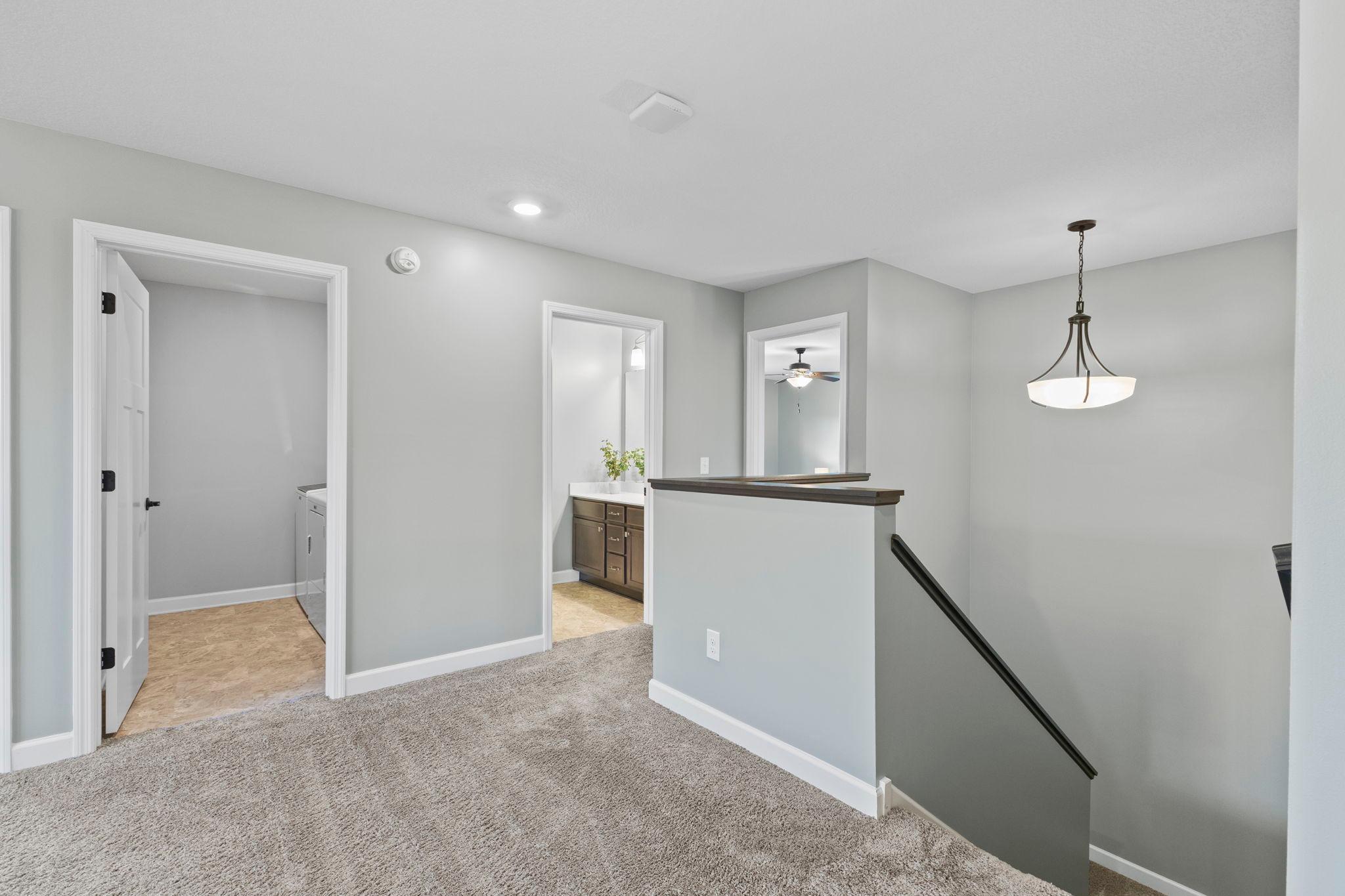 Head upstairs where you'll find 4-bedrooms..