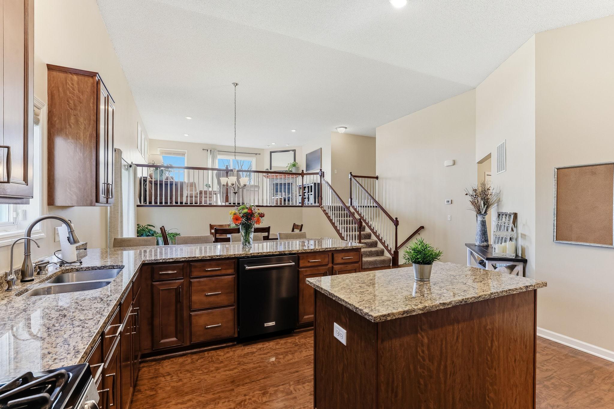 Elegant granite countertops, and ample cabinetry for all your storage needs.