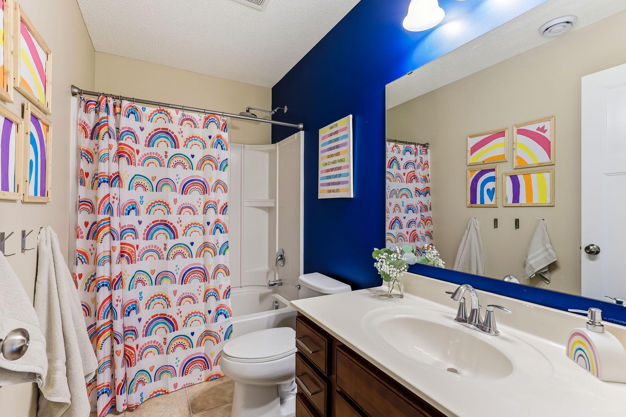 Full lower-level bathroom featuring a functional layout with all the essentials for comfort and convenience.