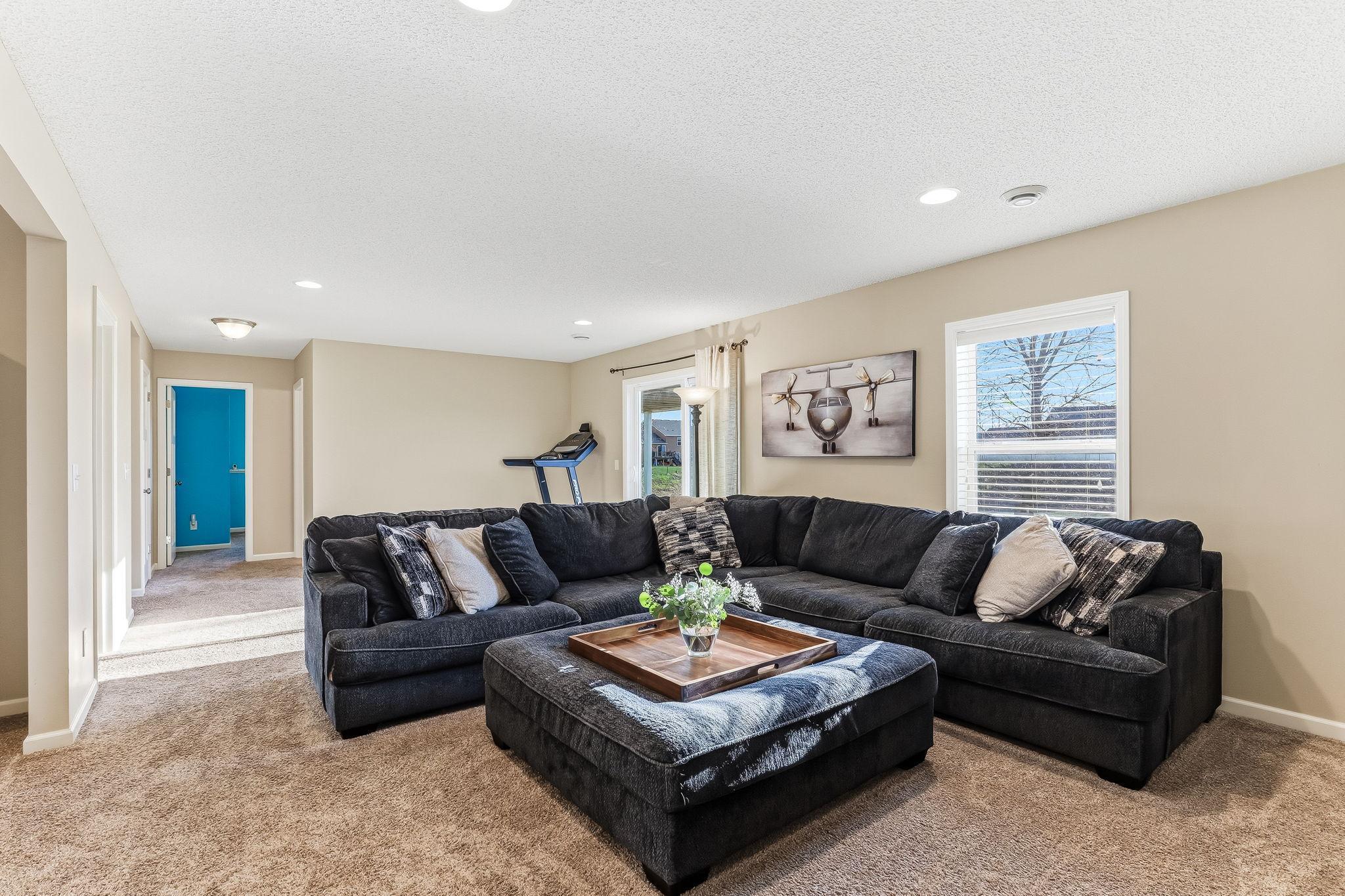 Sleek recessed lighting throughout the space offers a modern, updated feel.