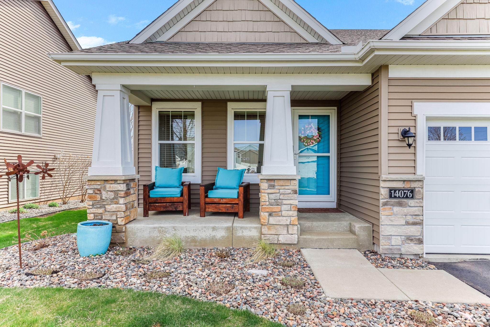 Inviting front porch perfect for relaxing and enjoying the neighborhood.