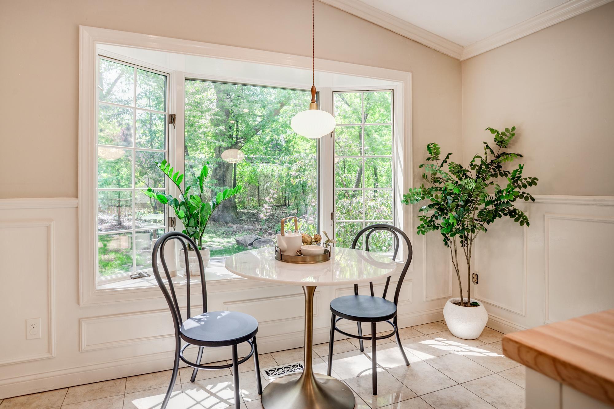Eat-in dining area with a bay window