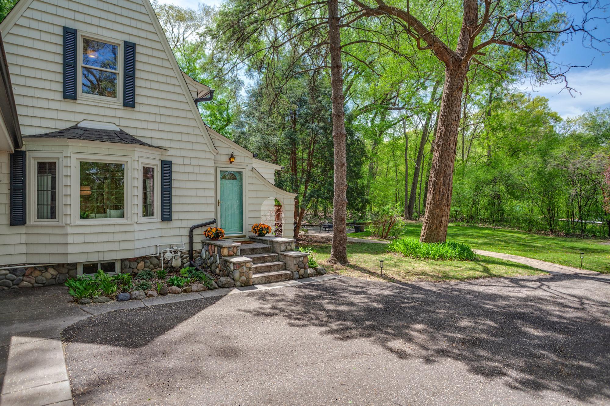 This 4 bed, 4 bath residence sits on a private 0.72-acre setting in the Minnetonka School District.