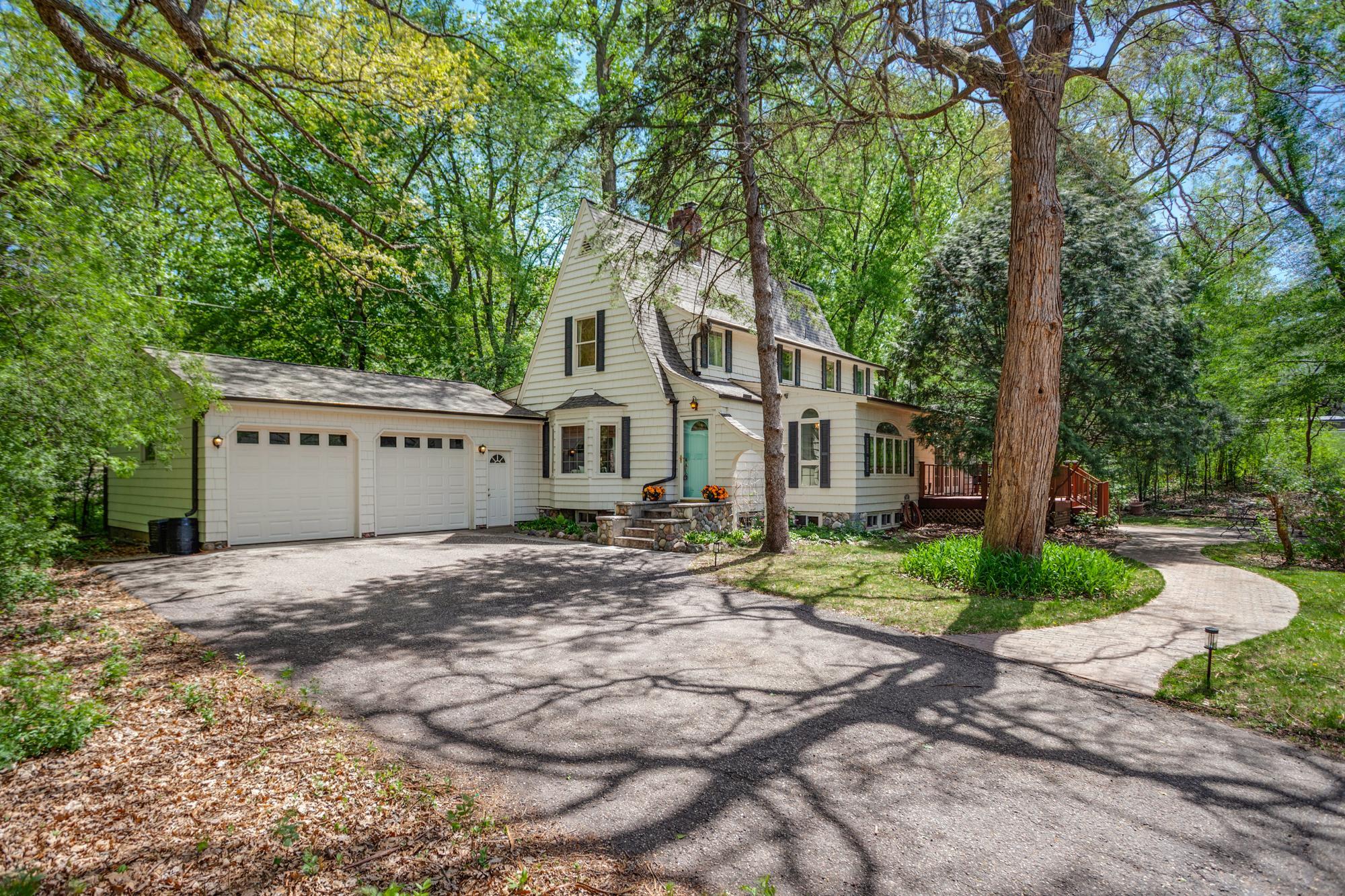 This 4 bed, 4 bath residence sits on a private 0.72-acre setting in the Minnetonka School District.