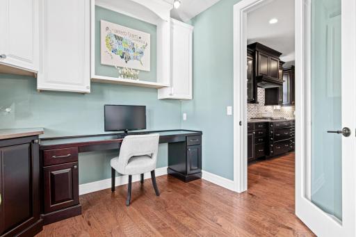 Flex room on the main floor off the kitchen and informal dining space.