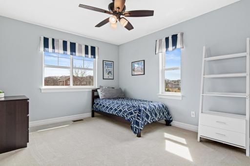 One of four bedrooms located upstairs. Lots of windows for bright, natural light and new carpet.