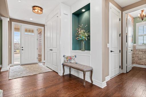 Greet family and friends in this oversized foyer with views to the dining room, two-story living room and beyond.