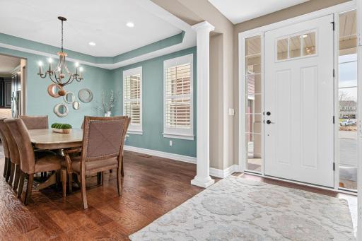 Formal dining room is situated with great natural light from the front of the home. Host the holidays this year in this elegant space.