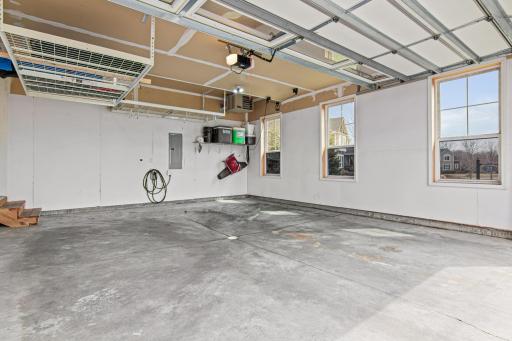 Clean and neat two stall garage with access to the laundry and mudroom.