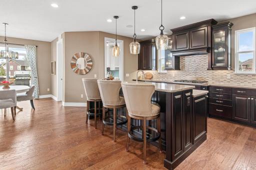 Dream kitchen with abundant counter and cabinet space. Freshly painted, newer light fixtures, appliances and more.