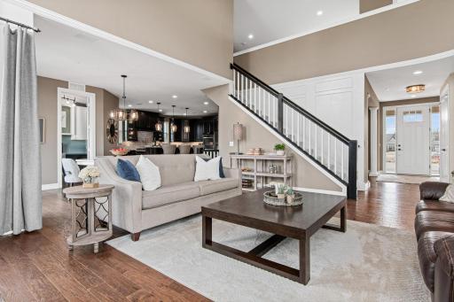 Breathtaking two-story great room with soaring ceilings and walls of windows.