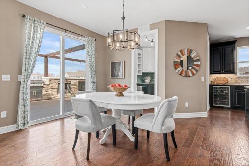 Open design flows effortlessly into the sunlit dinette and study area.