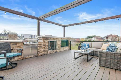 Spectacular maintenance free deck, grilling station, television and fireplace- designed for entertaining and fun.