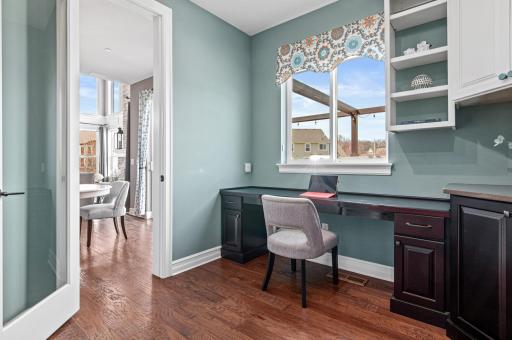 Homework, crafts, projects and more are easily completed in this fantastic flex room off the kitchen.