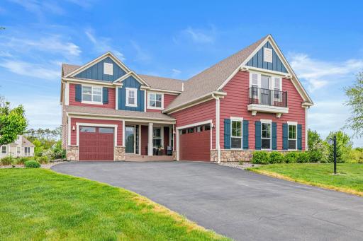Exceptional curb appeal welcomes you to this beautifully designed luxury residence. Large front porch is a great place for a cup of coffee or evening beverage.