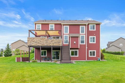 Large, flat backyard is perfect for fun and games. Kickball, bean bag tournament, football- the options are endless.