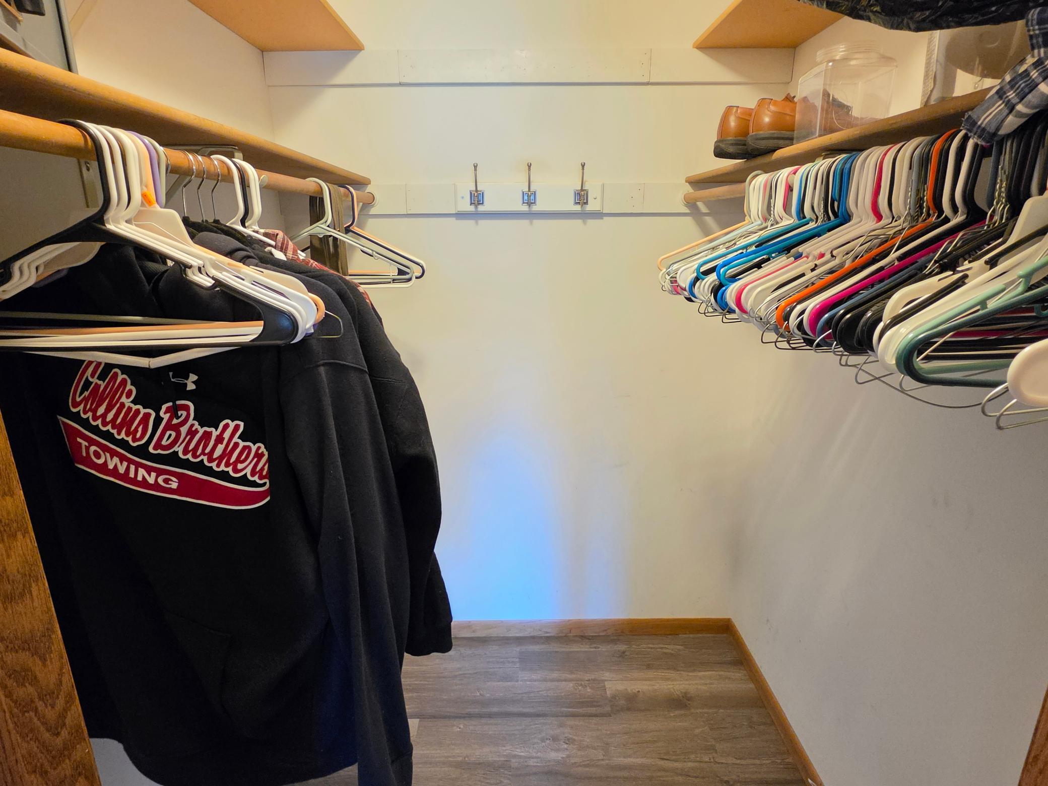 Primary walk in closet (new flooring here as well)